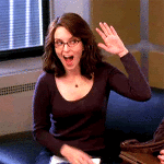 Tina Fey giving herself high five