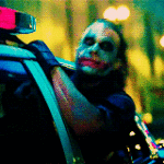 joker outside cop car window