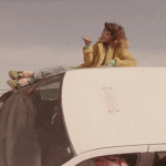 mia riding in car