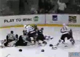 Hockey-Goalie-Jumps-on-top-of-Fight-AHL.gif