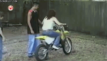 Girl-Drives-Dirtbike-into-Fence.gif
