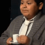 Manny Sipping out of Cup