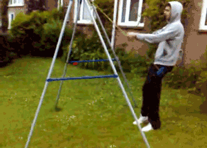 man tries to swing on a childâ€™s swing set which inevitably crashes ...