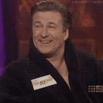 Alec Baldwin Laughing and Covering His Eyes