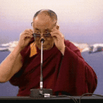 Dalai Lama Take Off Glasses and Laugh