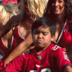 Kid Dances With Cheerleader