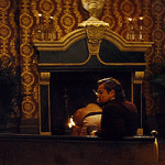 Leonaro DiCaprio Zoom in and Nod while smoking Django Unchained