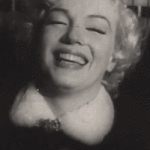 Marilyn Monroe and Joe Dimaggio Laughing