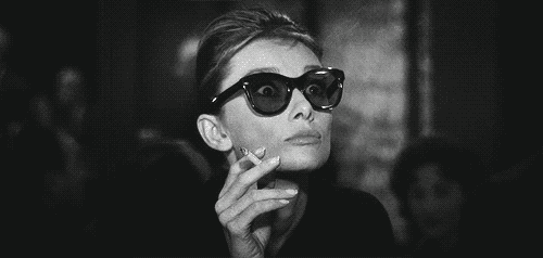 Audrey-Hepburn-Pulls-Down-Glasses.gif