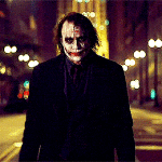 Joker Tosses Knife to Other Hand The Dark Knight