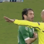 Shocked Soccer Player Looks at Referee