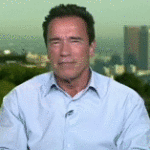 Arnold Schwarzenegger Listening then Laughing