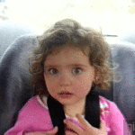 Young Girl Moves Eyebrows Up and Down Then Laughs