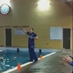 Coach Falls Into Water Trying to get Ball