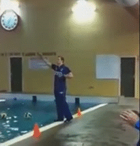 Coach-Falls-Into-Water-Trying-to-get-Bal