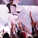 Miguel Jumps On Fan in BMA Crowd