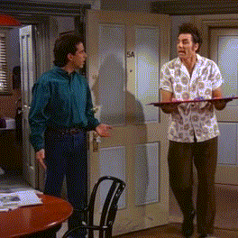 Kramer-Clears-Table-for-Board-Game-With-Leg-Seinfeld.gif