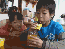Excited Kid Drinks Through Spongebob Straw