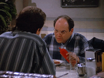 George-Costanza-Squirts-Ketchup-at-Table