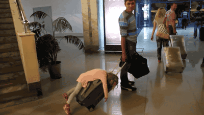 Image result for kids sitting on suitcase gif