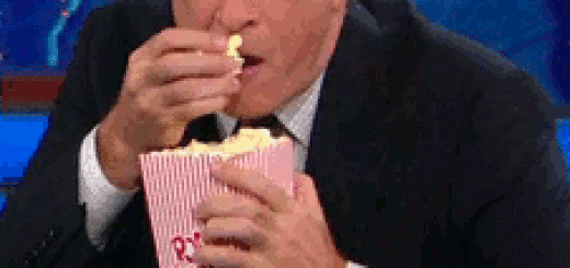 GIF: Man Eating Out of Big Bag of Popcorn | Gifrific