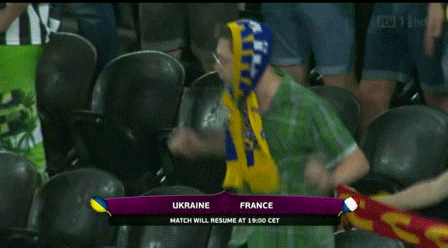 Ukraine-Fan-Dancing-in-Rain-Euro-2012.gif