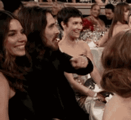 Christian-Bale-Laughing-at-Awards-Show.gif