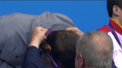 [Image: Michael-Phelps-15th-Gold-Medal.gif]
