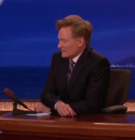 Conan-Confused-Shocked-Look-Taps-on-Desk.gif