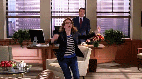 Liz Lemon Runs Out of Office Excited