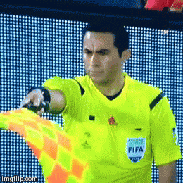 Referee-Smiles-After-Seeing-Hes-on-Camera-1.gif