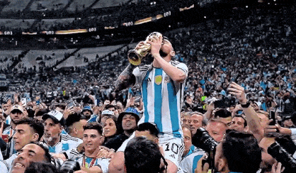 Lionel Messi Kisses and Holds the World Cup Trophy in the Air - Argentina France 2022 World Cup Final Quatar